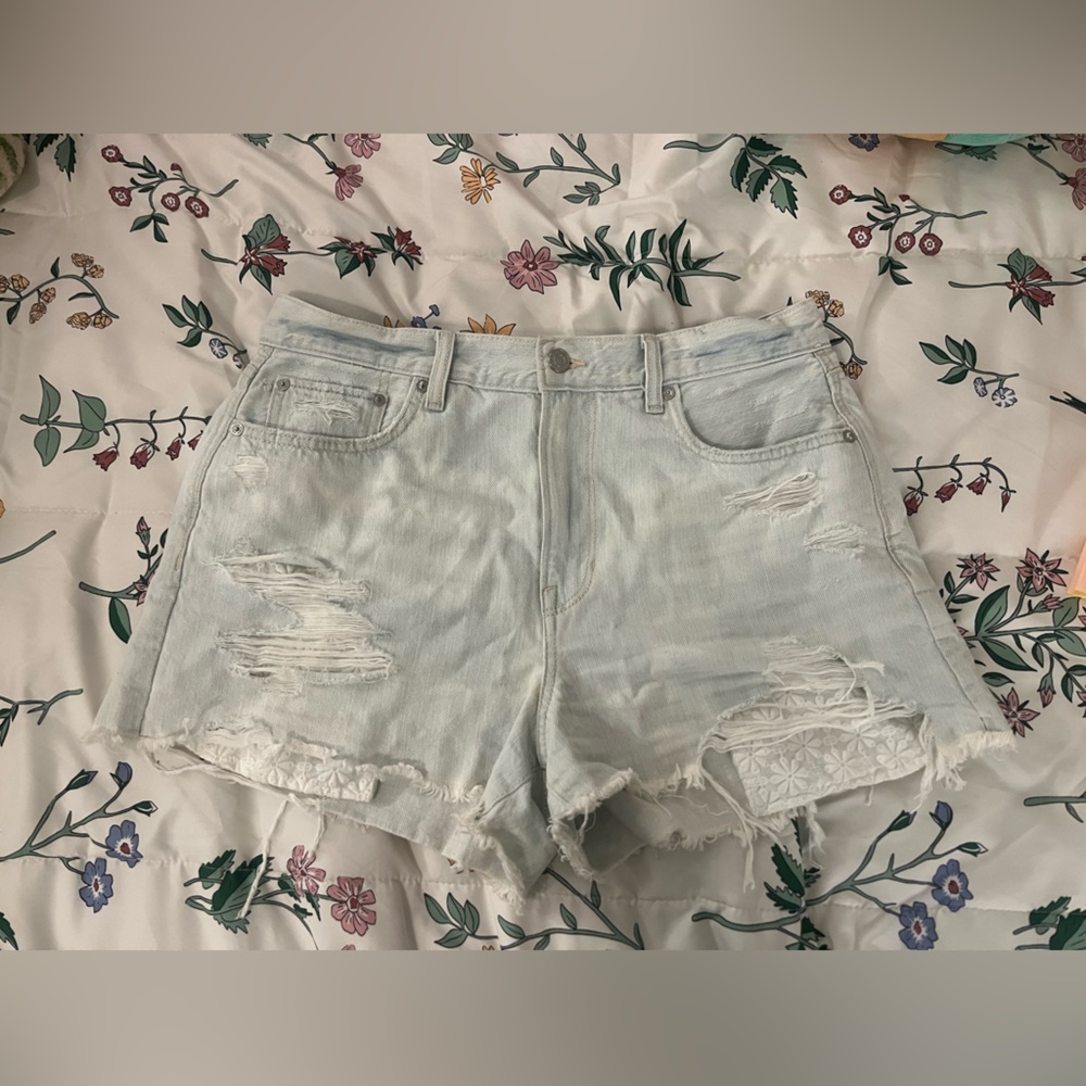Lightly worn light wash American Eagle distressed shorts
